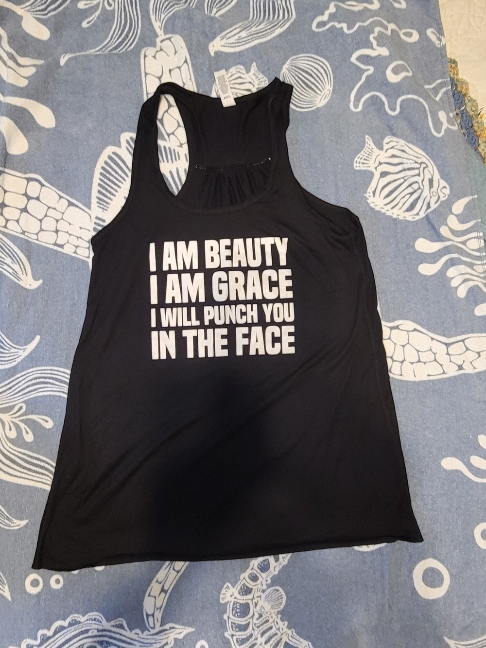 Bella Canvas Black Racerback Tank with White Bold Text